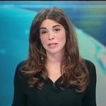 Italian TV presenter gives viewers a real news flash when she forgets she is sitting behind a glass desk