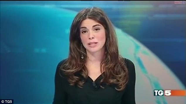 Italian TV presenter gives viewers a real news flash when she forgets she is sitting behind a glass desk